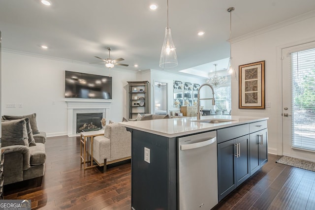 kitchen featuring a glass covered fireplace, a sink, dishwasher, crown molding, and open floor plan