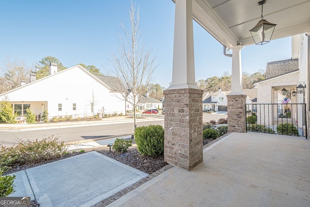 view of patio / terrace with a residential view