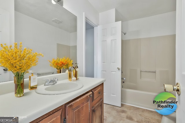 bathroom with visible vents, vanity, and bathing tub / shower combination