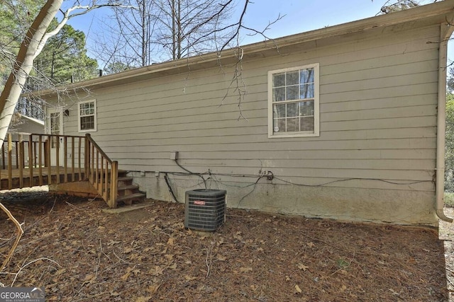 view of property exterior featuring central air condition unit