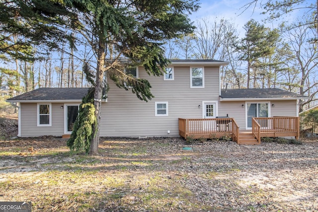 rear view of house with a deck