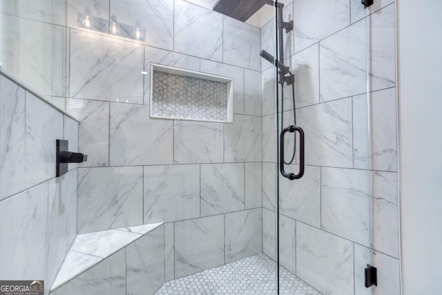 full bathroom featuring a shower stall