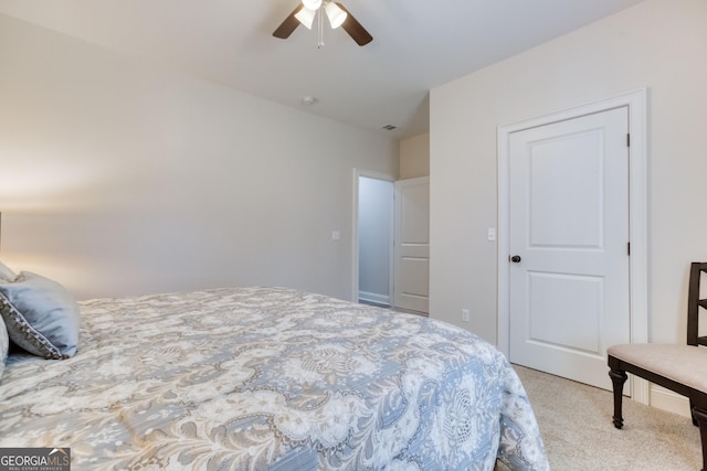 bedroom featuring ceiling fan and carpet flooring