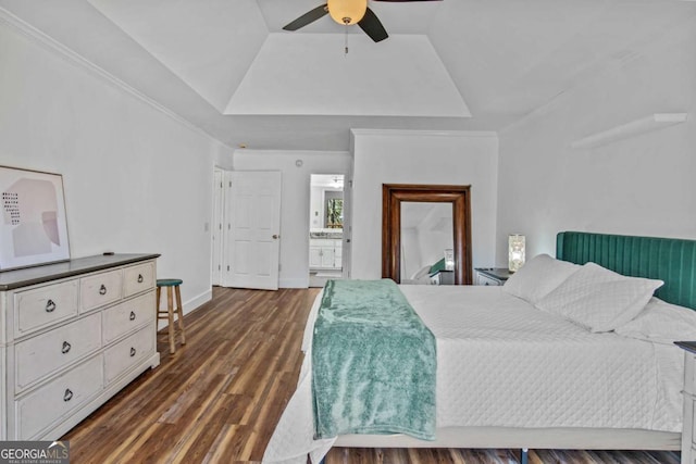 bedroom with baseboards, ceiling fan, wood finished floors, a tray ceiling, and crown molding