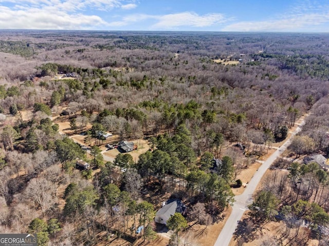 drone / aerial view with a forest view