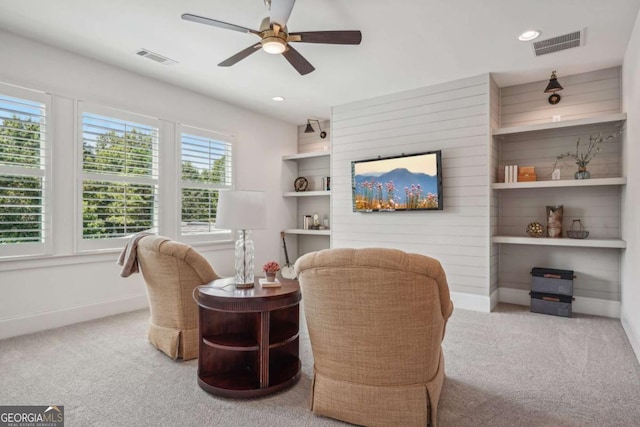 sitting room featuring a ceiling fan, visible vents, carpet flooring, and recessed lighting