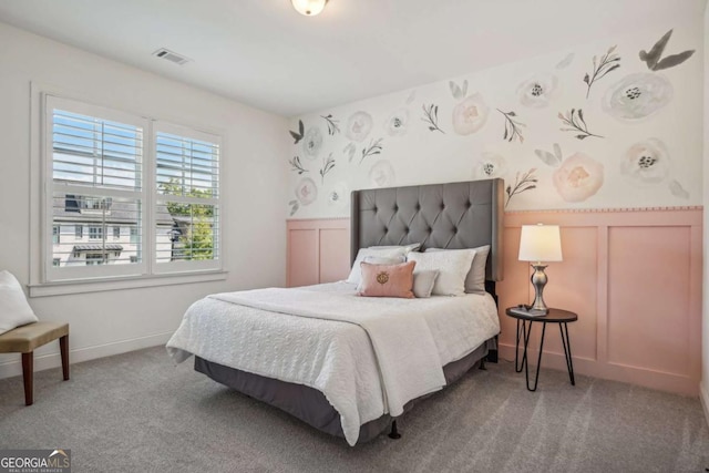 carpeted bedroom with visible vents