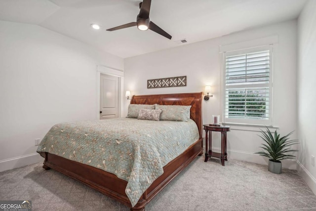 carpeted bedroom with a ceiling fan, recessed lighting, visible vents, and baseboards