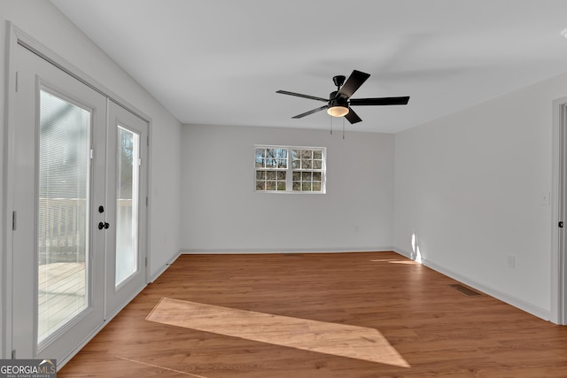 436 Tarpley Ave, Bowdon, GA 30108 - empty room featuring wood finished floors, baseboards, and ceiling fan