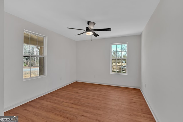 436 Tarpley Ave, Bowdon, GA 30108 - unfurnished room featuring wood finished floors, ceiling fan, and baseboards