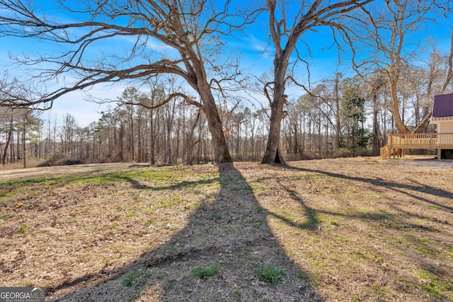 436 Tarpley Ave, Bowdon, GA 30108 - view of yard featuring a deck