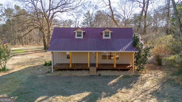 436 Tarpley Ave, Bowdon, GA 30108 - view of front of home featuring metal roof and covered porch