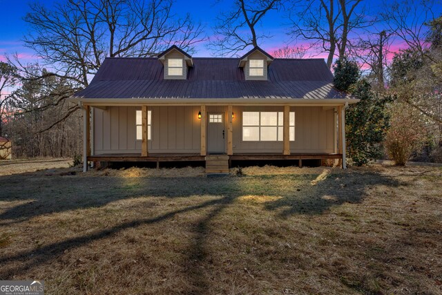 436 Tarpley Ave, Bowdon, GA 30108 - view of front of house with a yard, a porch, and metal roof