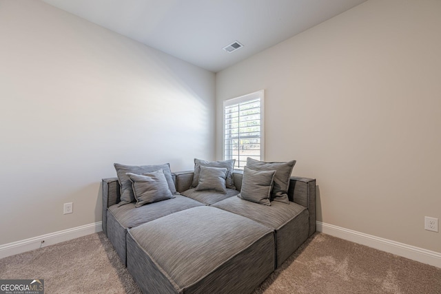 bedroom with carpet, visible vents, and baseboards