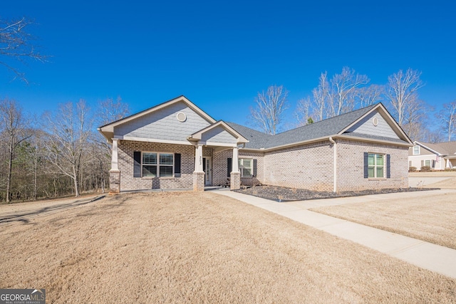 view of front of home with brick siding