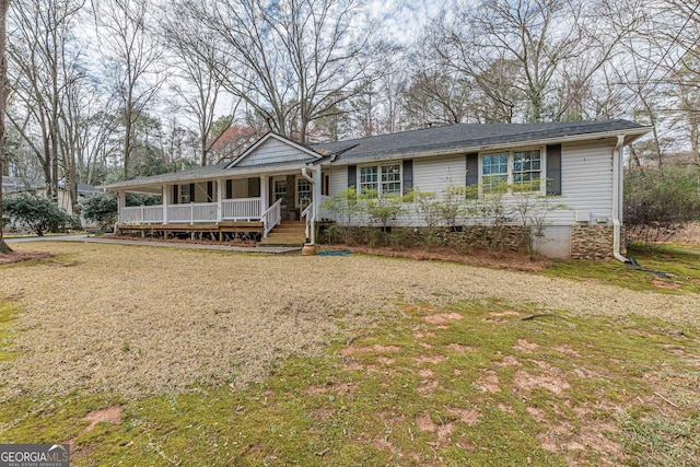 view of front of house featuring crawl space and covered porch