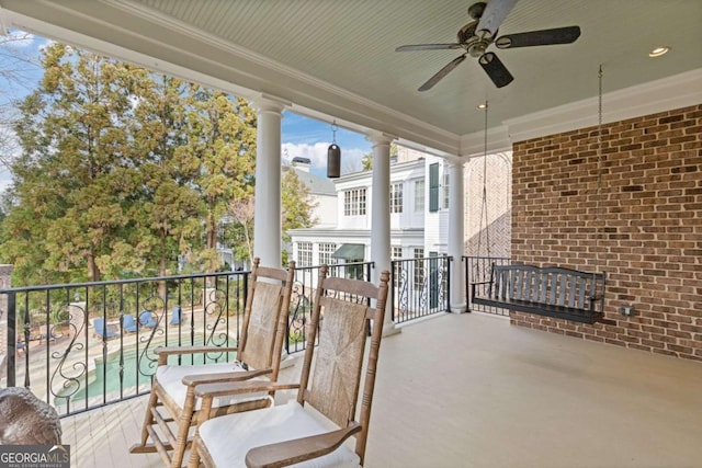 balcony with a ceiling fan