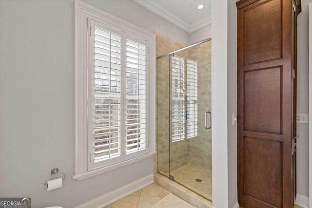 full bath with crown molding, a stall shower, plenty of natural light, baseboards, and tile patterned floors