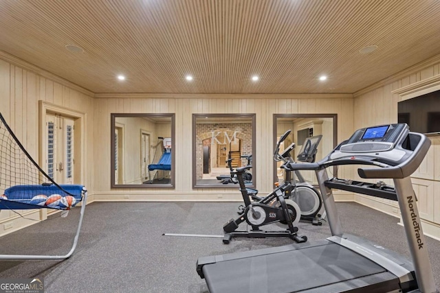 workout area featuring ornamental molding and recessed lighting