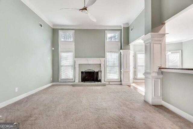 2477 Misty Rose Ln, Loganville, GA 30052 - unfurnished living room with carpet flooring, a ceiling fan, and ornamental molding