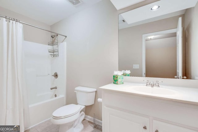 bathroom featuring visible vents, toilet, tile patterned flooring, shower / bath combo with shower curtain, and vanity