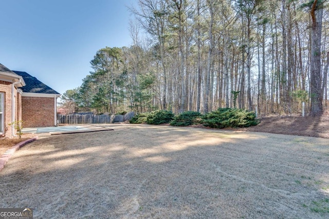 view of yard with fence