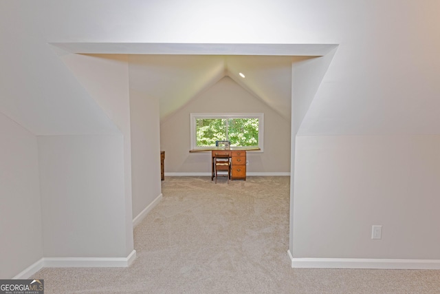 bonus room featuring carpet flooring, vaulted ceiling, and baseboards