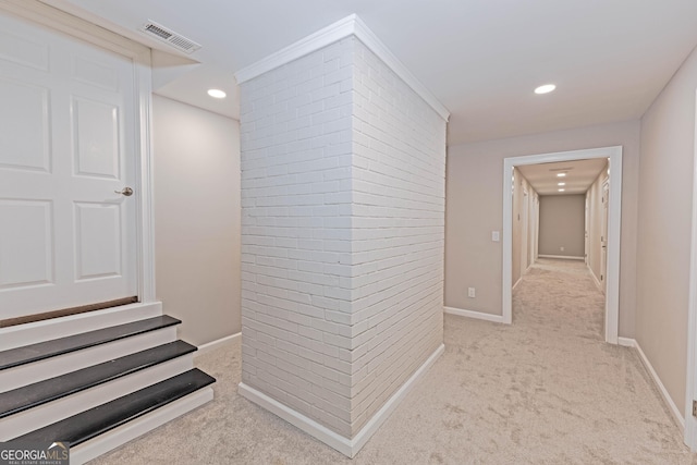 hallway with light carpet, baseboards, visible vents, and recessed lighting