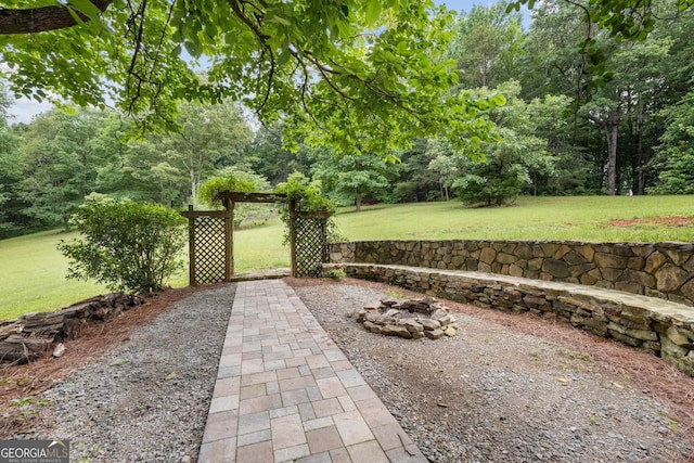 exterior space with an outdoor fire pit