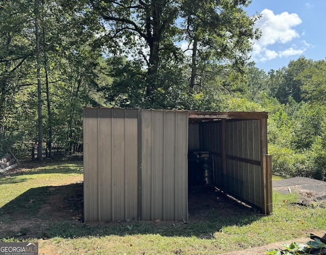 view of outbuilding with an outbuilding