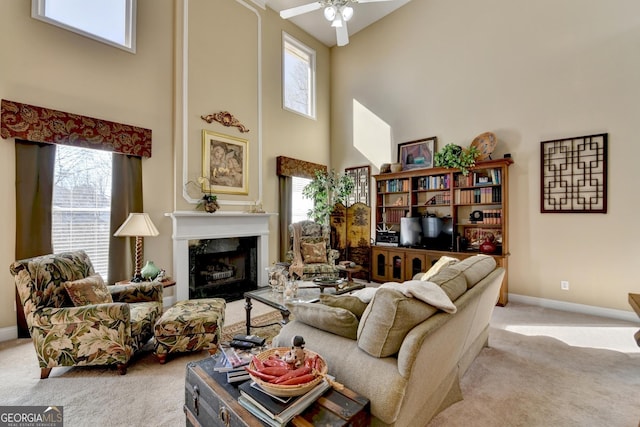 1301 Dayspring Trce, Lawrenceville, GA 30045 - living room featuring carpet flooring, plenty of natural light, baseboards, and a premium fireplace