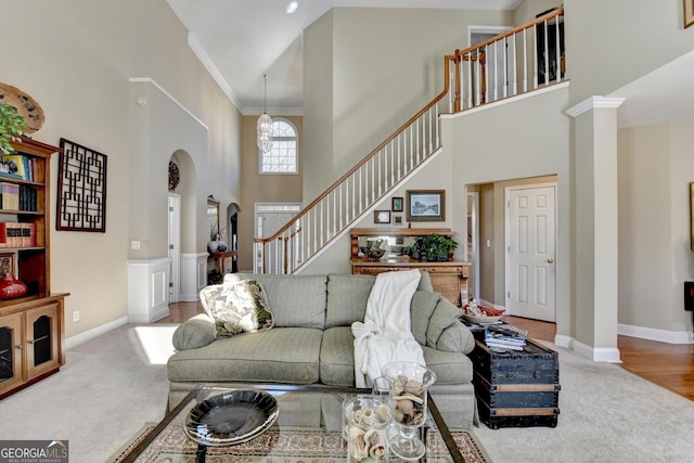 1301 Dayspring Trce, Lawrenceville, GA 30045 - living room featuring carpet, stairs, and a high ceiling