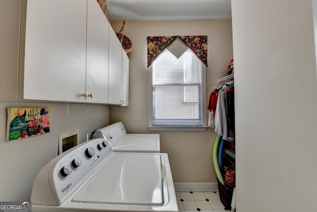 1301 Dayspring Trce, Lawrenceville, GA 30045 - washroom featuring cabinet space, baseboards, and washer and clothes dryer