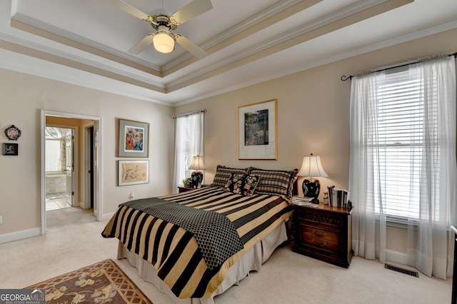 1301 Dayspring Trce, Lawrenceville, GA 30045 - bedroom featuring light carpet, visible vents, baseboards, ornamental molding, and a raised ceiling