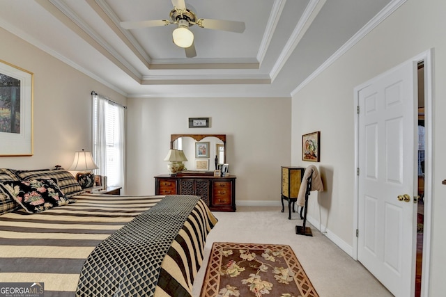1301 Dayspring Trce, Lawrenceville, GA 30045 - bedroom with crown molding, a raised ceiling, light colored carpet, ceiling fan, and baseboards
