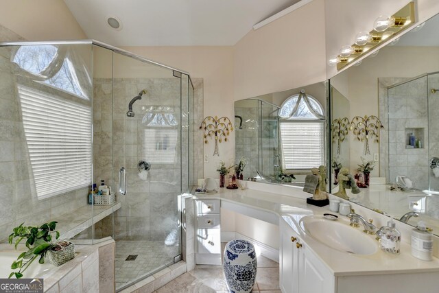 1301 Dayspring Trce, Lawrenceville, GA 30045 - full bathroom featuring a stall shower, tile patterned floors, vaulted ceiling, and vanity
