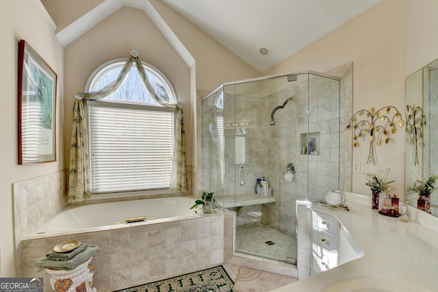 1301 Dayspring Trce, Lawrenceville, GA 30045 - full bath featuring lofted ceiling, vanity, a shower stall, and a bath