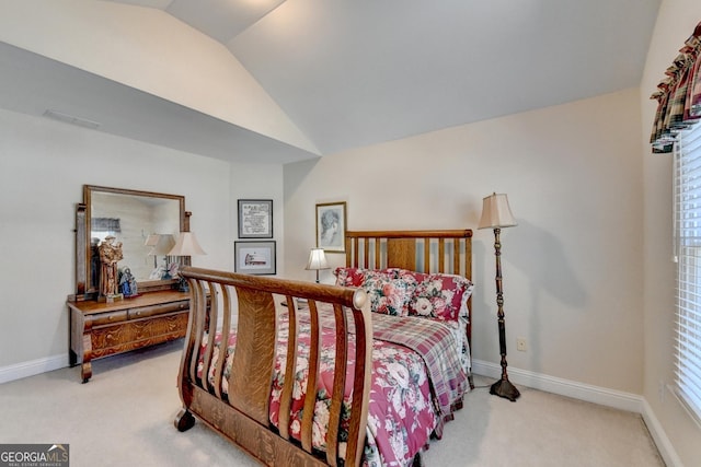 1301 Dayspring Trce, Lawrenceville, GA 30045 - carpeted bedroom featuring lofted ceiling, visible vents, and baseboards
