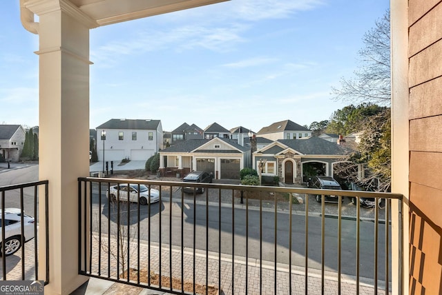 balcony featuring a residential view