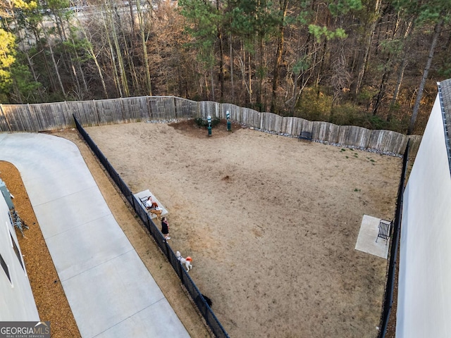 view of yard with a fenced backyard