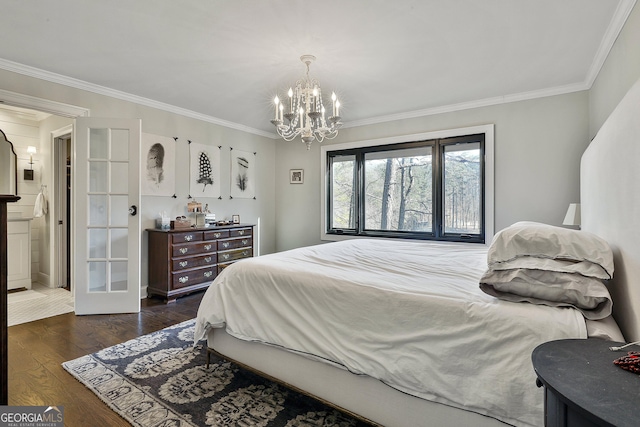 bedroom with ornamental molding, dark wood-style flooring, and a notable chandelier