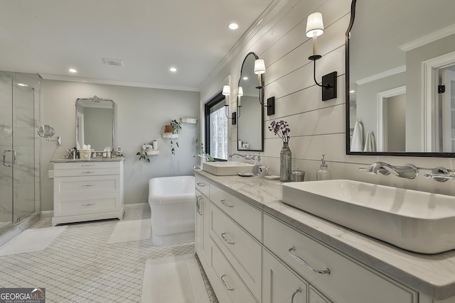 full bath with ornamental molding, visible vents, a sink, and tile patterned floors