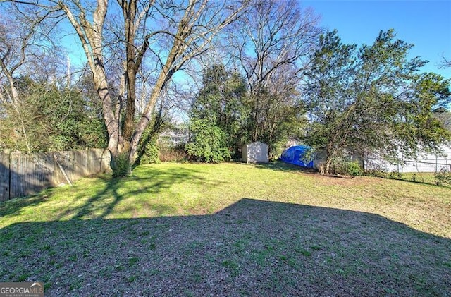 view of yard featuring fence