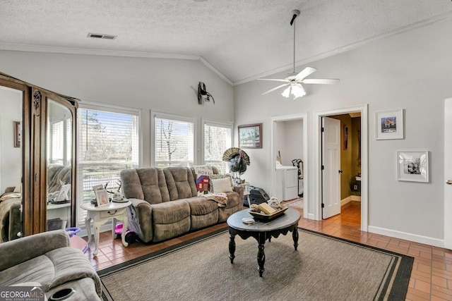 living area featuring brick floor, crown molding, lofted ceiling, visible vents, and baseboards