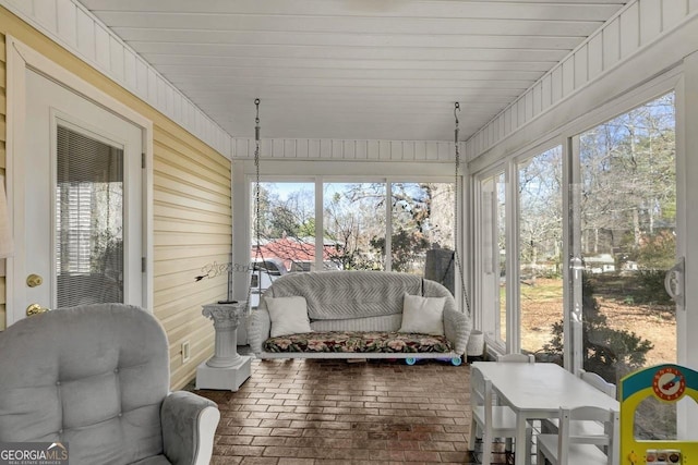 sunroom / solarium with a wealth of natural light