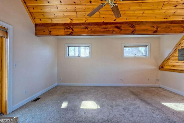 bonus room with carpet, visible vents, ceiling fan, and baseboards