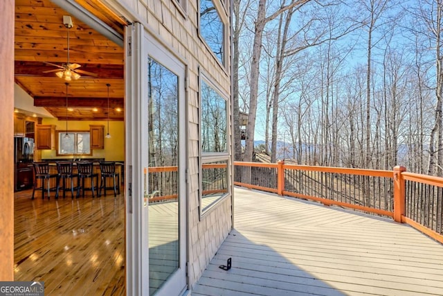 wooden terrace with outdoor dry bar