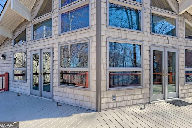 wooden terrace featuring french doors