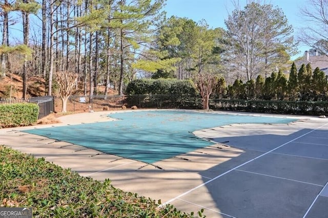 pool featuring fence