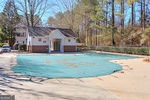 pool featuring a patio area